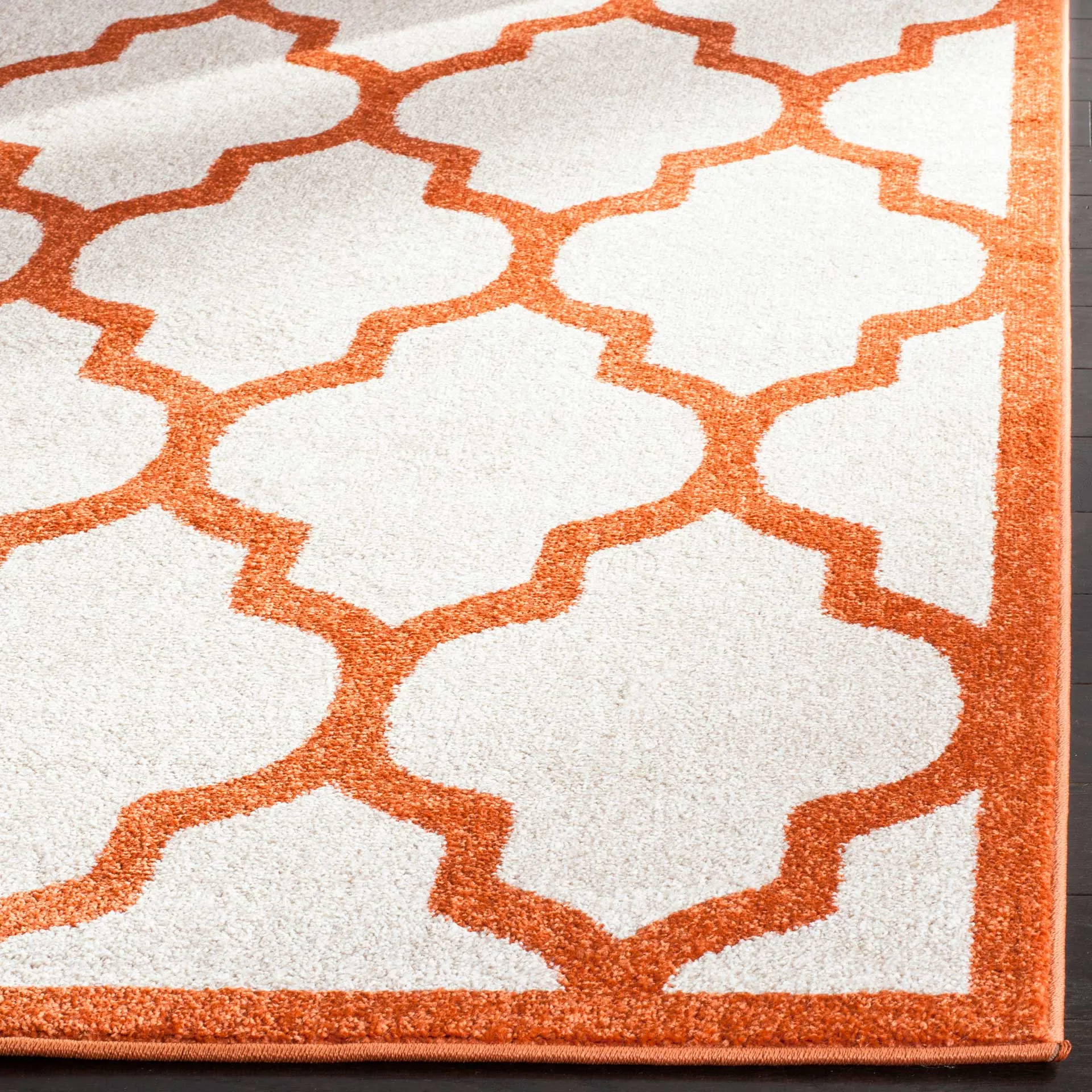 Amherst Quatrefoil Beige/Orange Area Rug